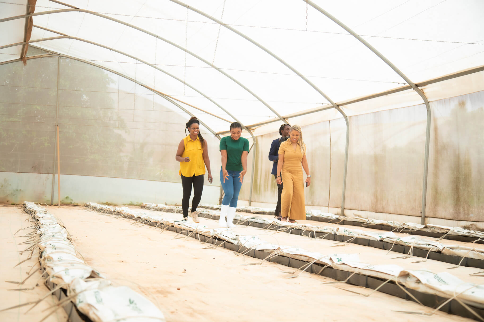Rising Star Recipient standing in garden with SheSTEAM team...image for purely decorative purposes for Rising Star Page